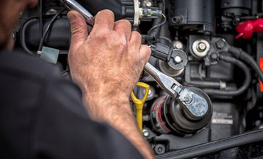 MerCruiser tech servicing an engine
